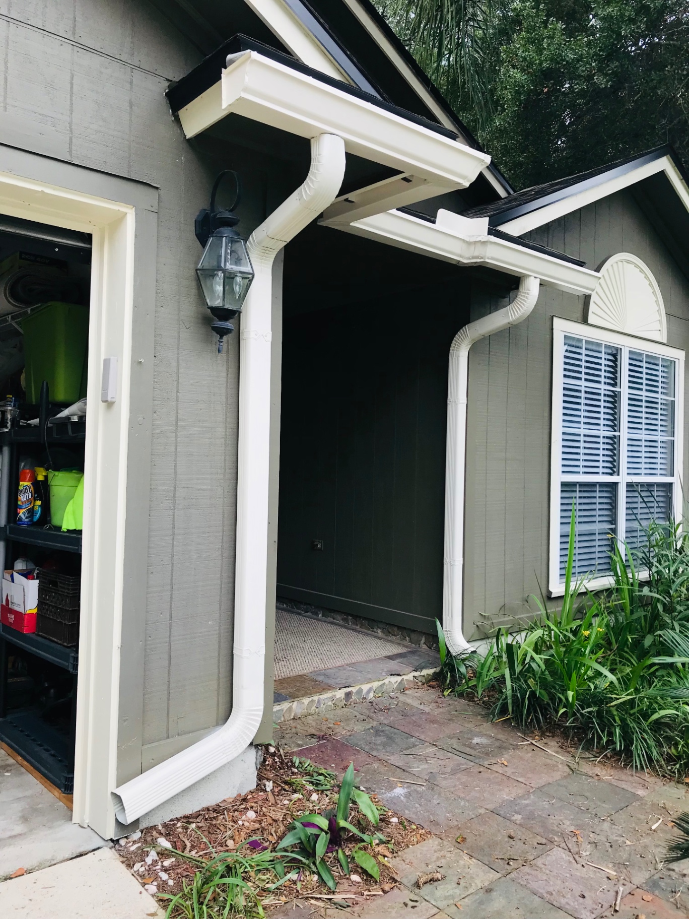 Oversized downspouts · entryway