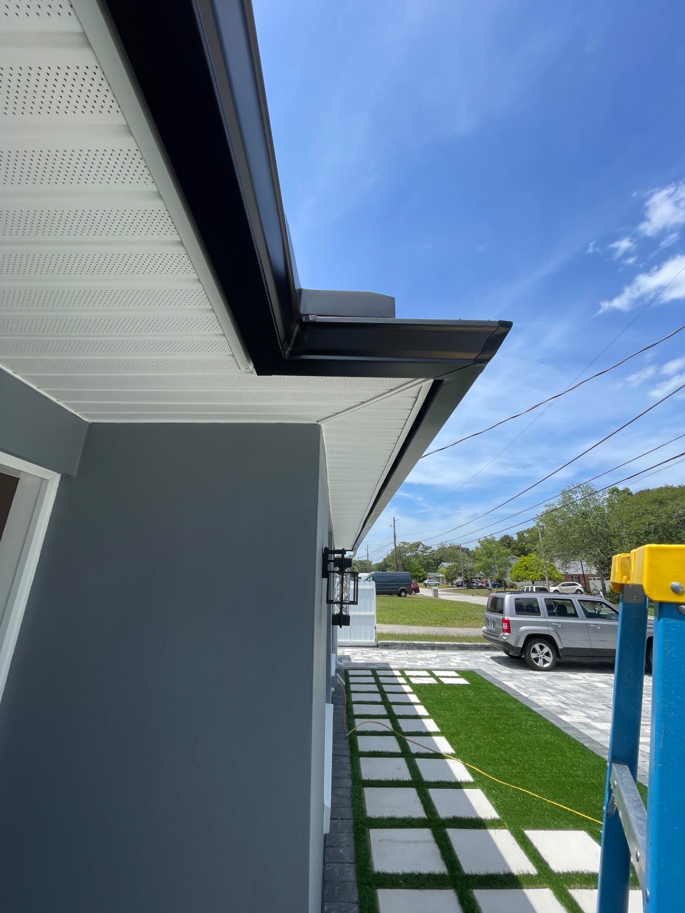 Bronze fascia detail · new construction